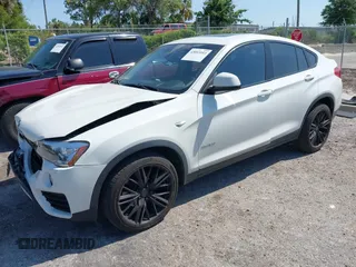2015 BMW X4 xDrive28i with VIN 5UXXW3C59F0M88331, listed as a IAAI auction lot 42093953 with 138,205 mi miles and . Bid and sale history available at DreamBid. Image 2.