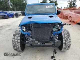 2022 Jeep Gladiator Rubicon with VIN 1C6JJTBG4NL111323, listed as a Copart auction lot 58772405 with 25,997 mi miles and Salvage title. Bid and sale history available at DreamBid. Image 5.