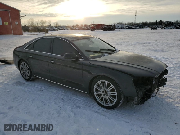 2016 Audi A8 with VIN WAUJRAFD5GN007742, listed as a Copart auction lot 44698375 with 110,830 mi miles and Salvage title. Bid and sale history available at DreamBid. Image 4.