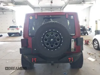 2011 Jeep Wrangler Unlimited Rubicon with VIN 1J4BA6H18BL584486, listed as a IAAI auction lot 42340661 with 152,896 mi miles and . Bid and sale history available at DreamBid. Image 16.