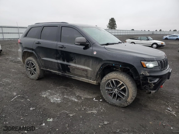 2018 Jeep Grand Cherokee Trailhawk with VIN 1C4RJFLT0JC202513, listed as a Copart auction lot 83184124 with NaN miles and Salvage Title. Bid and sale history available at carsss.com. Image 4.