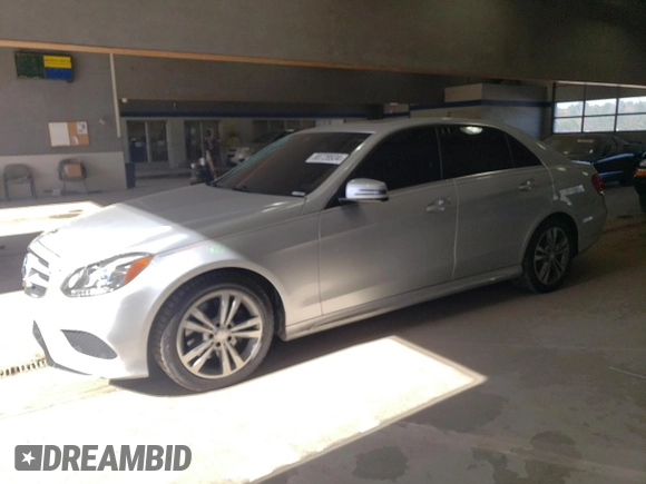2014 Mercedes-Benz E 400 Sport with VIN WDDHF9FB3EA947278, listed as a Copart auction lot 80728934 with 108,824 mi miles and Salvage Title. Bid and sale history available at DreamBid. Image 1.
