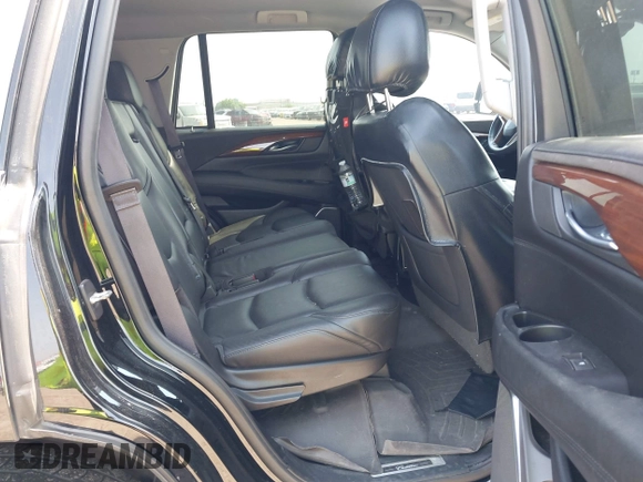 2017 Cadillac Escalade z VIN 1GYS3AKJ4HR338806, wystawiony jako IAAI lot #41941193 z przebiegiem 119 865 mil mil oraz . Historia ofert i sprzedaży dostępna na DreamBid. Obrazek 8.
