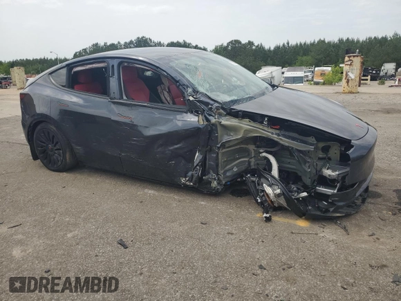 2024 Tesla Model Y z VIN 7SAYGDED4RA331714, wystawiony jako Copart lot #57043915 z przebiegiem Nie podano mil oraz Szkoda całkowita • Salvage title. Historia ofert i sprzedaży dostępna na DreamBid. Obrazek 4.
