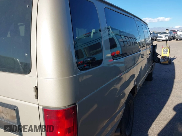 2010 Ford Econoline Passenger XL with VIN 1FBSS3BL7ADA29540, listed as a IAAI auction lot 41022591 with 208,662 mi miles. Bid and sale history available at carsss.com. Image 4.