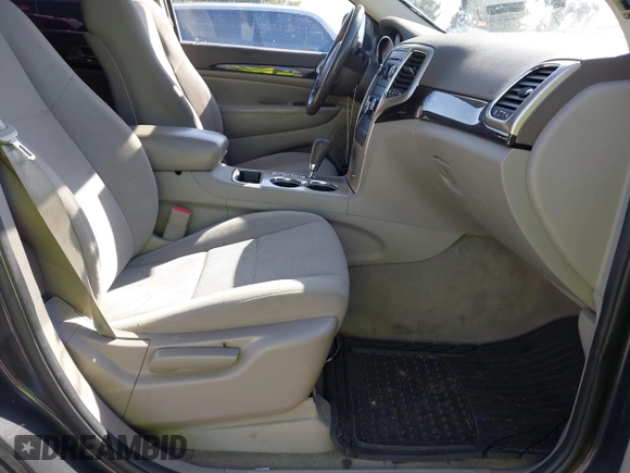 2011 Jeep Grand Cherokee Laredo z VIN 1J4RR4GG6BC562133, wystawiony jako IAAI lot #42330831 z przebiegiem 168 657 mil mil oraz . Historia ofert i sprzedaży dostępna na DreamBid. Obrazek 5.