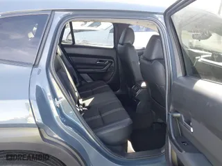 2024 Mazda CX-50 2.5 S Premium Package with VIN 7MMVABDMXRN163458, listed as a IAAI auction lot 41228299 with 8,771 mi miles. Bid and sale history available at carsss.com. Image 8.