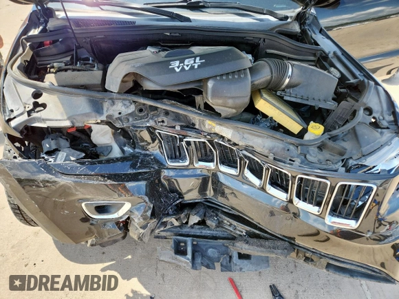 2014 Jeep Grand Cherokee Limited with VIN 1C4RJFBG9EC121990, listed as a Copart auction lot 64079495 with 98,615 mi miles and Salvage title. Bid and sale history available at DreamBid. Image 11.
