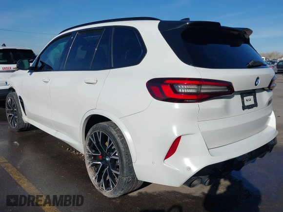 2022 BMW X5 M with VIN 5YMJU0C02N9K39077, listed as a IAAI auction lot 41711996 with 11,875 mi miles. Bid and sale history available at carsss.com. Image 3.