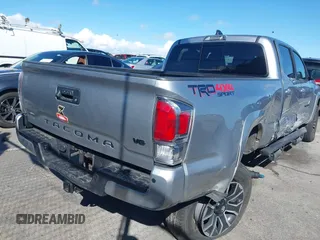 2022 Toyota Tacoma SR5 with VIN 3TMDZ5BN6NM122590, listed as a IAAI auction lot 41714578 with 56,472 mi miles and . Bid and sale history available at DreamBid. Image 4.