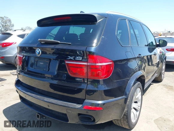 2013 BMW X5 xDrive50i with VIN 5UXZV8C5XD0C15908, listed as a IAAI auction lot 42536233 with 190,627 mi miles and . Bid and sale history available at DreamBid. Image 4.