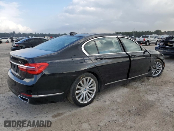 2018 BMW 7 Series 740i with VIN WBA7E2C54JG742927, listed as a Copart auction lot 70306082 with 69,735 mi miles. Bid and sale history available at carsss.com. Image 3.