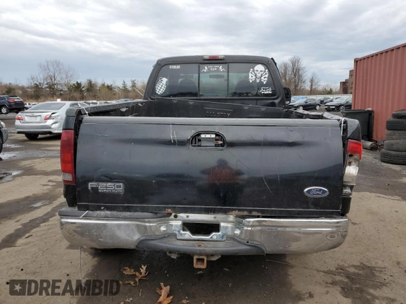 2000 Ford F-250 XL with VIN 1FTNX21L5YEC66604, listed as a Copart auction lot 51754055 with 167,798 mi miles and Salvage title. Bid and sale history available at DreamBid. Image 6.