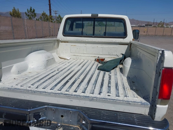 1990 Ford F-150 with VIN 2FTDF15N6LCA44303, listed as a IAAI auction lot 41981297 with 63,097 mi miles. Bid and sale history available at carsss.com. Image 8.