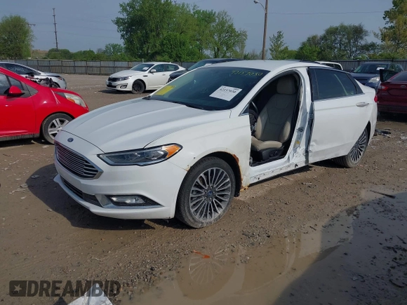 2018 Ford Fusion Titanium with VIN 3FA6P0RU2JR246812, listed as a IAAI auction lot 42157030 with 168,680 mi miles and . Bid and sale history available at DreamBid. Image 2.