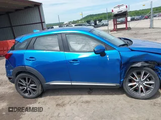 2016 Mazda CX-3 Grand Touring z VIN JM1DKFD78G0134173, wystawiony jako IAAI lot #42179942 z przebiegiem 93 539 mil mil oraz . Historia ofert i sprzedaży dostępna na DreamBid. Obrazek 14.