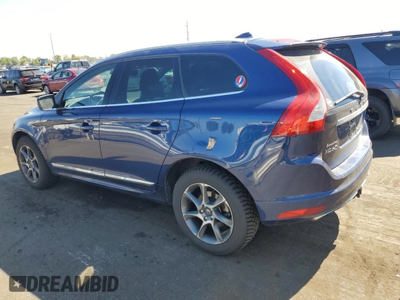 2015 Volvo XC60 z VIN YV449MDV9F2712943, wystawiony jako Copart lot #64517144 z przebiegiem 102 071 mil mil oraz Czysty tytuł • Clean title. Historia ofert i sprzedaży dostępna na DreamBid. Obrazek 2.