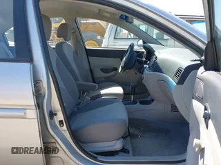 2007 Hyundai Accent GLS with VIN KMHCN46C57U087156, listed as a IAAI auction lot 42151298 with 81,588 mi miles. Bid and sale history available at carsss.com. Image 5.