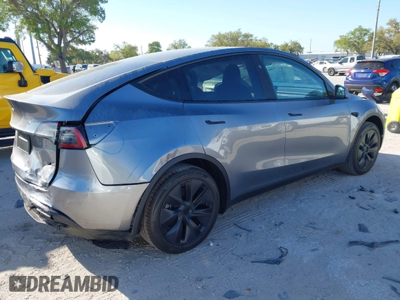 2025 Tesla Model Y Long Range with VIN 7SAYGDED7SA376233, listed as a IAAI auction lot 41777876 with 70 mi miles and . Bid and sale history available at DreamBid. Image 4.