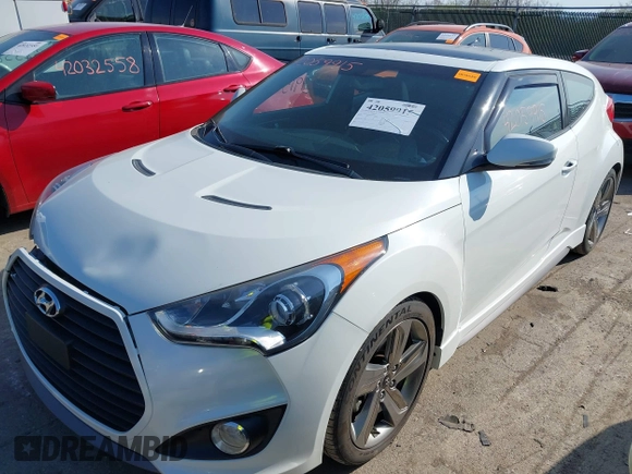 2015 Hyundai Veloster Turbo with VIN KMHTC6AE4FU234611, listed as a IAAI auction lot 42059915 with 107,388 mi miles. Bid and sale history available at carsss.com. Image 2.