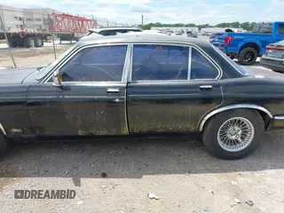 1982 Jaguar XJ with VIN SAJAV1248CC341050, listed as a IAAI auction lot 42653594 with Not provided miles and . Bid and sale history available at DreamBid. Image 14.