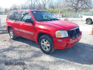 2002 GMC Envoy SLT with VIN 1GKDT13S322512505, listed as a IAAI auction lot 42056266 with 139,793 mi miles. Bid and sale history available at carsss.com. Image 1.