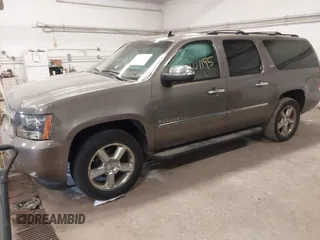 2012 Chevrolet Suburban LTZ with VIN 1GNSKKE79CR180400, listed as a IAAI auction lot 41807195 with 154,410 mi miles and . Bid and sale history available at carsss.com. Image 2.