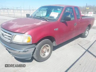 2000 Ford F-150 XL with VIN 1FTZX172XYNC36332, listed as a IAAI auction lot 41699806 with 278,119 mi miles. Bid and sale history available at carsss.com. Image 2.