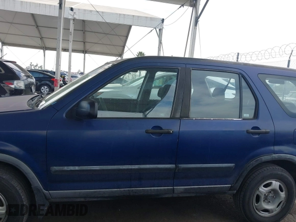 2004 Honda CR-V LX with VIN JHLRD684X4C023539, listed as a IAAI auction lot 42032809 with 186,056 mi miles and . Bid and sale history available at carsss.com. Image 14.