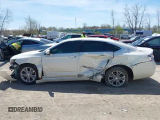 2014 Chevrolet Impala LT with VIN 2G1115SL4E9222651, listed as a IAAI auction lot 42066230 with 190,679 mi miles and . Bid and sale history available at DreamBid. Image 14.