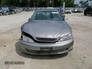 2001 Lexus ES 300 with VIN JT8BF28G615110977, listed as a Copart auction lot 55073025 with 194,948 mi miles and Salvage Title. Bid and sale history available at DreamBid. Image 13.
