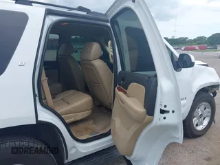 2007 Chevrolet Tahoe LTZ with VIN 1GNFC13J47J336516, listed as a IAAI auction lot 42545424 with 211,669 mi miles and . Bid and sale history available at DreamBid. Image 8.