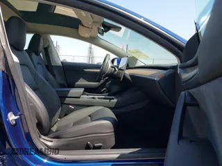 2023 Tesla Model 3 z VIN 5YJ3E1EA6PF547209, wystawiony jako IAAI lot #42511077 z przebiegiem 6 125 mil mil oraz . Historia ofert i sprzedaży dostępna na DreamBid. Obrazek 5.