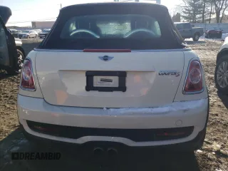 2014 MINI Convertible S z VIN WMWZP3C58ET707569, wystawiony jako Copart lot #42129485 z przebiegiem 62 343 mil mil oraz Szkoda całkowita • Salvage title. Historia ofert i sprzedaży dostępna na DreamBid. Obrazek 6.