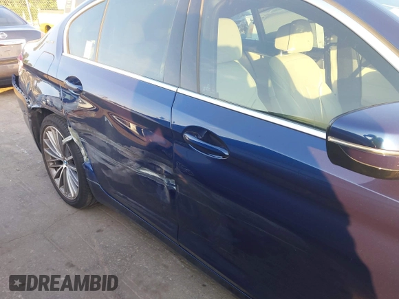 2019 BMW 5 Series 530e with VIN WBAJA9C58KB391755, listed as a IAAI auction lot 42659993 with 56,296 mi miles and . Bid and sale history available at DreamBid. Image 6.