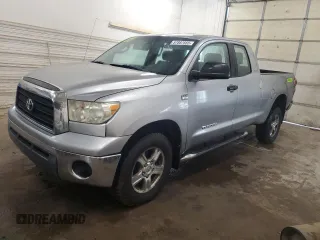 2007 Toyota Tundra SR5 with VIN 5TBBT54197S451993, listed as a Copart auction lot 57887565 with 284,398 mi miles and Salvage title. Bid and sale history available at DreamBid. Image 1.