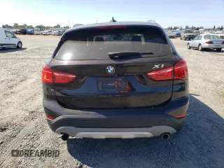 2017 BMW X1 xDrive28i z VIN WBXHT3C32H5F73536, wystawiony jako Copart lot #58431875 z przebiegiem 108 549 mil mil oraz Szkoda całkowita • Salvage title. Historia ofert i sprzedaży dostępna na DreamBid. Obrazek 6.