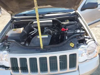 2008 Jeep Grand Cherokee Laredo with VIN 1J8GR48K28C169859, listed as a IAAI auction lot 41965149 with 166,069 mi miles. Bid and sale history available at carsss.com. Image 10.