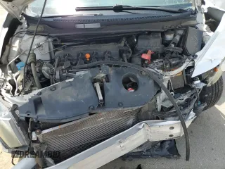 2015 Honda Civic EX-L z VIN 19XFB2F91FE011417, wystawiony jako Copart lot #55143755 z przebiegiem 134 653 mil mil oraz Szkoda całkowita • Salvage title. Historia ofert i sprzedaży dostępna na DreamBid. Obrazek 11.