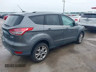 2014 Ford Escape Titanium with VIN 1FMCU0JX8EUD31028, listed as a IAAI auction lot 41943690 with 91,295 mi miles. Bid and sale history available at carsss.com. Image 4.