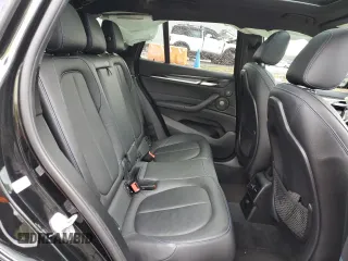2016 BMW X1 xDrive28i with VIN WBXHT3C34G5F64464, listed as a Copart auction lot 65818472 with 74,385 mi miles. Bid and sale history available at carsss.com. Image 6.
