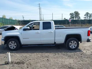 2017 GMC Sierra 1500 SLE z VIN 1GTV2MEC0HZ291794, wystawiony jako IAAI lot #42055172 z przebiegiem 235 969 mil mil oraz . Historia ofert i sprzedaży dostępna na DreamBid. Obrazek 14.
