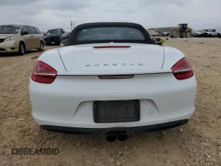 2013 Porsche Boxster с VIN WP0CA2A82DS113808, выставлен на аукционе Copart как лот 86105554 с пробегом 58 526 миль миль и Списание • Salvage title. История ставок и продаж доступна на DreamBid. Изображение 6.