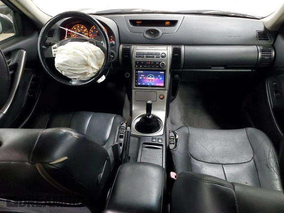 2003 Infiniti G35 w/Leather with VIN JNKCV51EX3M323960, listed as a Copart auction lot 74465534 with 208,433 mi miles and Salvage Title. Bid and sale history available at DreamBid. Image 8.