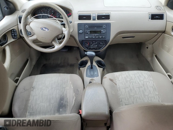 2005 Ford Focus S with VIN 1FAFP34N55W105530, listed as a Copart auction lot 59186695 with 136,204 mi miles and Salvage title. Bid and sale history available at DreamBid. Image 8.