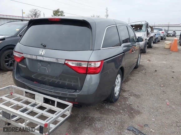 2013 Honda Odyssey LX with VIN 5FNRL5H24DB042230, listed as a IAAI auction lot 40954067 with 212,154 mi miles. Bid and sale history available at carsss.com. Image 4.