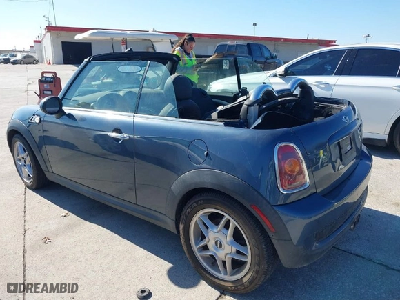 2010 MINI Cooper Convertible S with VIN WMWMS3C51ATZ85345, listed as a IAAI auction lot 41472622 with NaN miles. Bid and sale history available at carsss.com. Image 3.