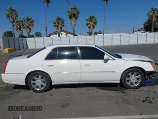 2007 Cadillac DTS Luxury I z VIN 1G6KD57Y77U133267, wystawiony jako IAAI lot #42337188 z przebiegiem 126 063 mil mil oraz . Historia ofert i sprzedaży dostępna na DreamBid. Obrazek 14.
