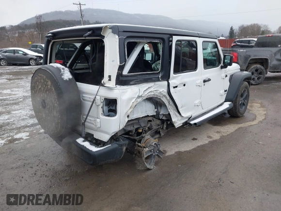2021 Jeep Wrangler Unlimited Sport Altitude with VIN 1C4HJXDG2MW791599, listed as a IAAI auction lot 41235427 with 47,220 mi miles and . Bid and sale history available at DreamBid. Image 6.
