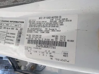 2013 Ford Fusion SE Hybrid with VIN 3FA6P0LU8DR272165, listed as a IAAI auction lot 41333539 with 196,843 mi miles. Bid and sale history available at carsss.com. Image 9.